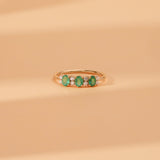 oval cut emerald round cut diamond ring