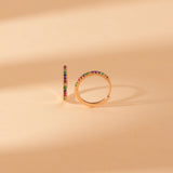 side view of colorful rainbow sapphire solid 14k gold hoop huggies