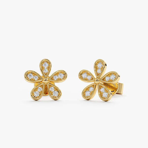 Handmade pair of solid 14k gold flower studs with five petals with paved diamonds 