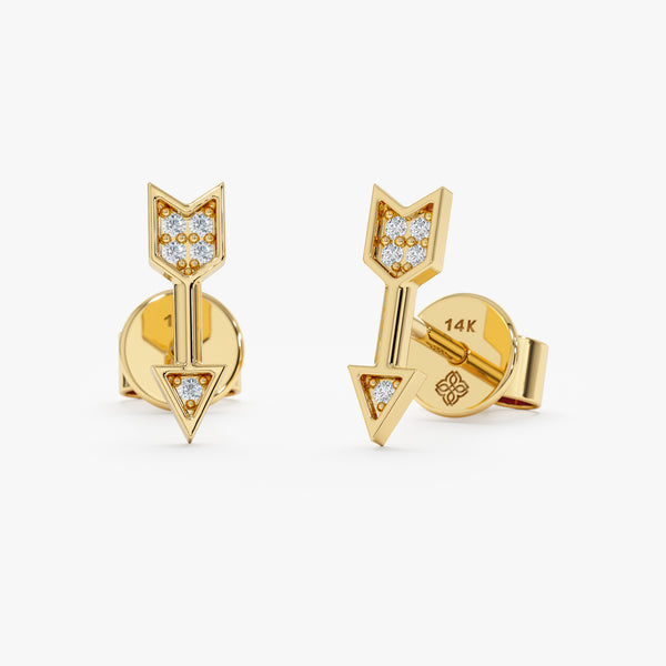 Handmade pair of solid 14k gold arrow stud earrings with paved diamonds