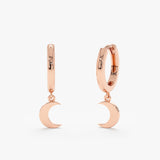 Pair of 14k solid rose gold crescent moon charm ear huggies.