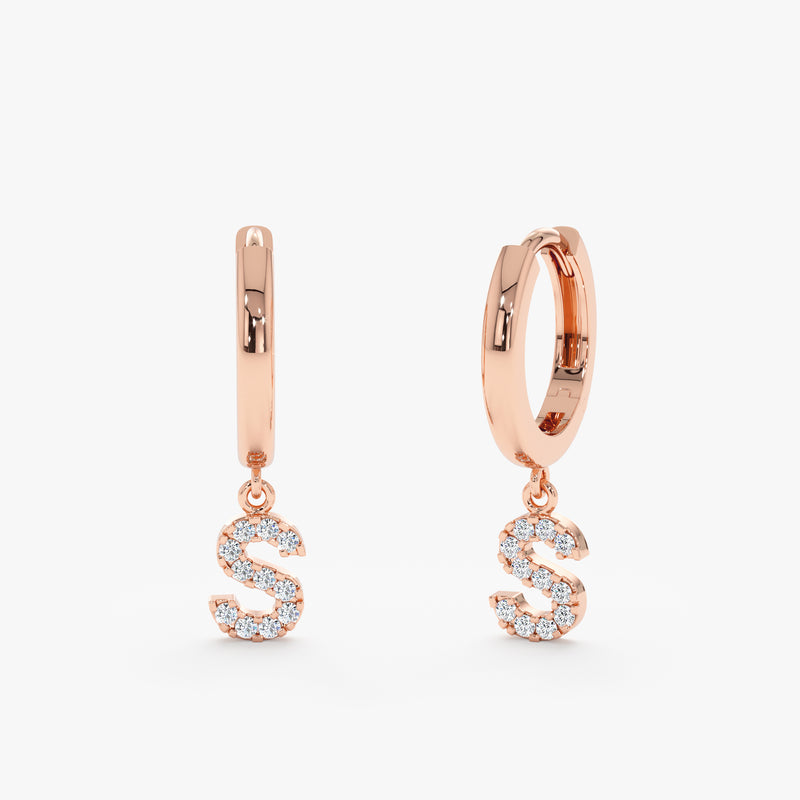 Pair of solid 14k rose gold initial letter charm drop earrings with diamonds