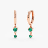 Pair of 14k solid rose gold huggies with double emerald stones