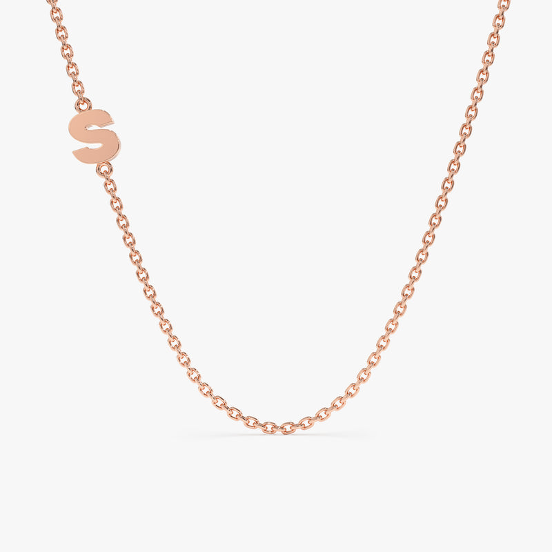 petite rose gold necklace with a side initial