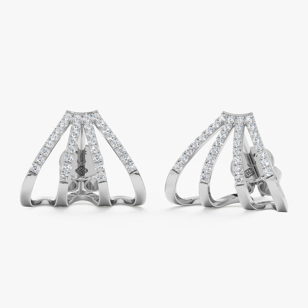 handcrafted pair of solid 14k white gold cage huggie studs with lined diamonds in arrow shape 