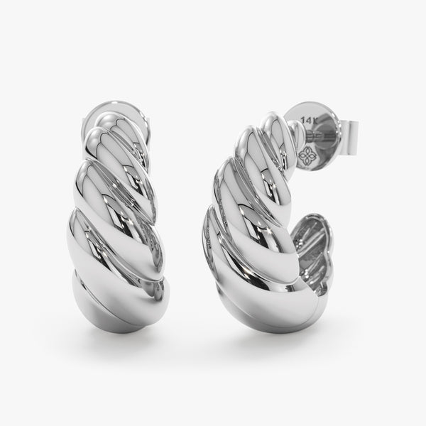 Thick vintage inspired croissant twisted huggie design handcrafted in 14k solid white gold. 