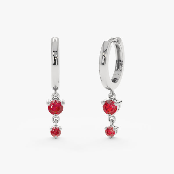 Handmade pair of 14k solid white gold huggies with two hanging rubies