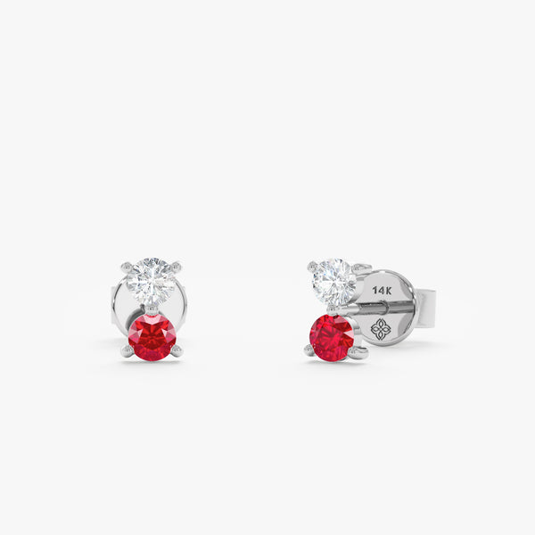 Handcrafted pair of solid 14k gold ruby stud earrings with single diamond 