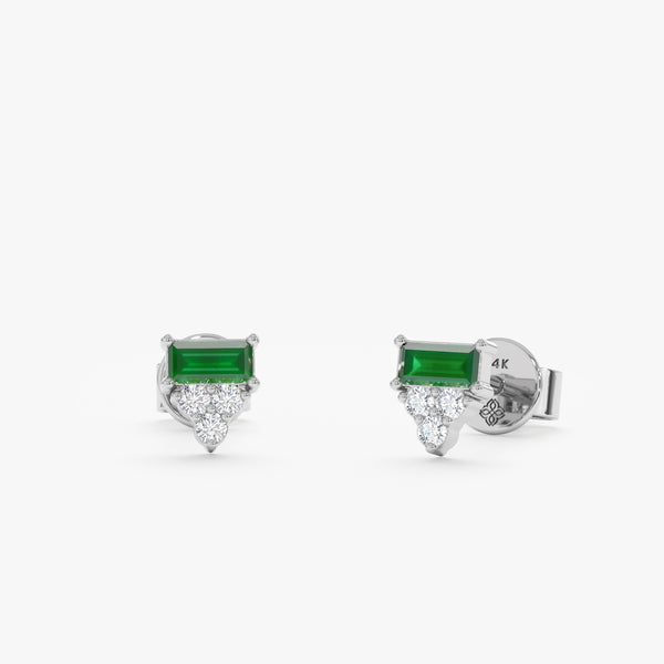 Pair of solid 14k white gold emerald baguette and three diamond stud earrings