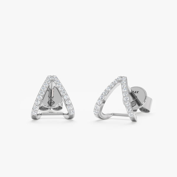 handcrafted pair of solid 14k white gold v shape diamond lined huggie studs