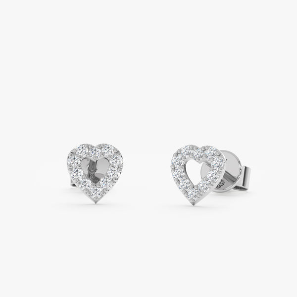 Handcrafted pair of solid 14k white gold diamond heart outline stud earrings