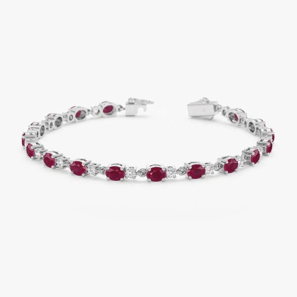 Garland tennis bracelet with diamonds and rubies in white gold