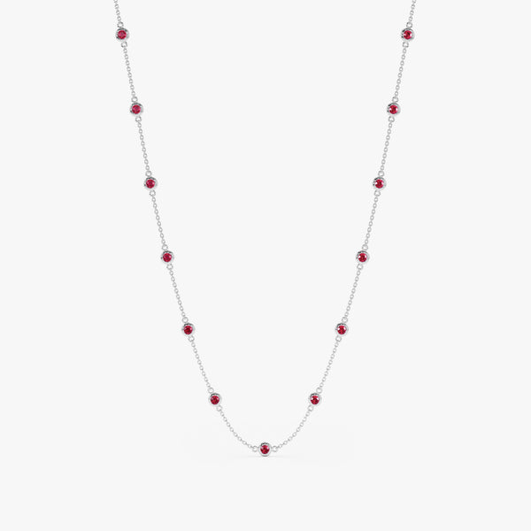 Elegant ruby necklace strung along a white gold chain.