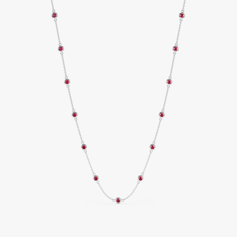 Elegant ruby necklace strung along a white gold chain.