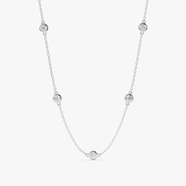 solid white gold diamond by the yard necklace with five bezel diamonds