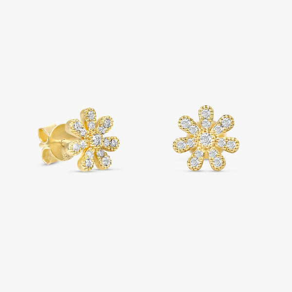 handmade pair of solid 14k gold daisy flower stud earrings with diamonds