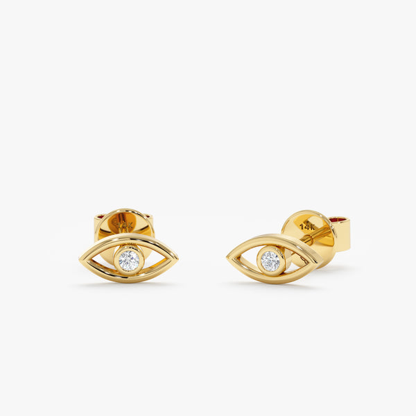 handmade pair of solid 14k gold eye stud earrings with single diamond