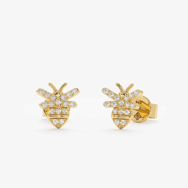 handmade pair of solid 14k yellow gold bumblebee stud earrings with diamonds