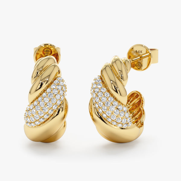 Handmade 14k solid gold croissant twist ear huggies with natural lined diamonds. 