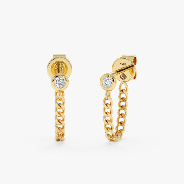 Pair of Solid 14k gold diamond stud earrings with drop down cuban chain