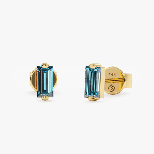 handmade pair of solid 14k gold natural blue topaz baguette cut stud earrings