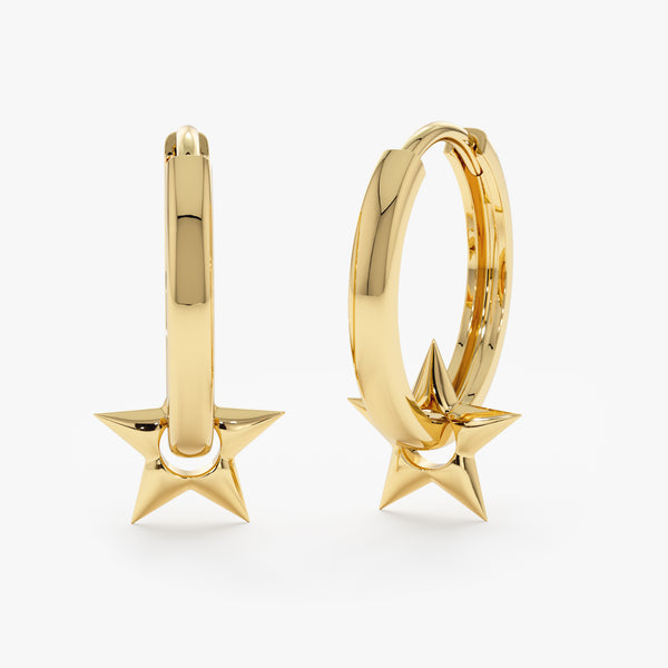 handmade pair of solid gold hoop earrings with pointed star charm