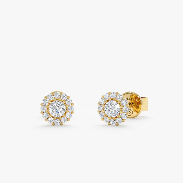 Pair of handmade diamond stud earrings in 14k solid gold 