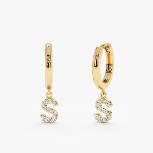 Pair of initial charm huggie earrings in 14k solid gold with diamonds 