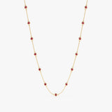 Ruby station necklace crafted in solid gold.