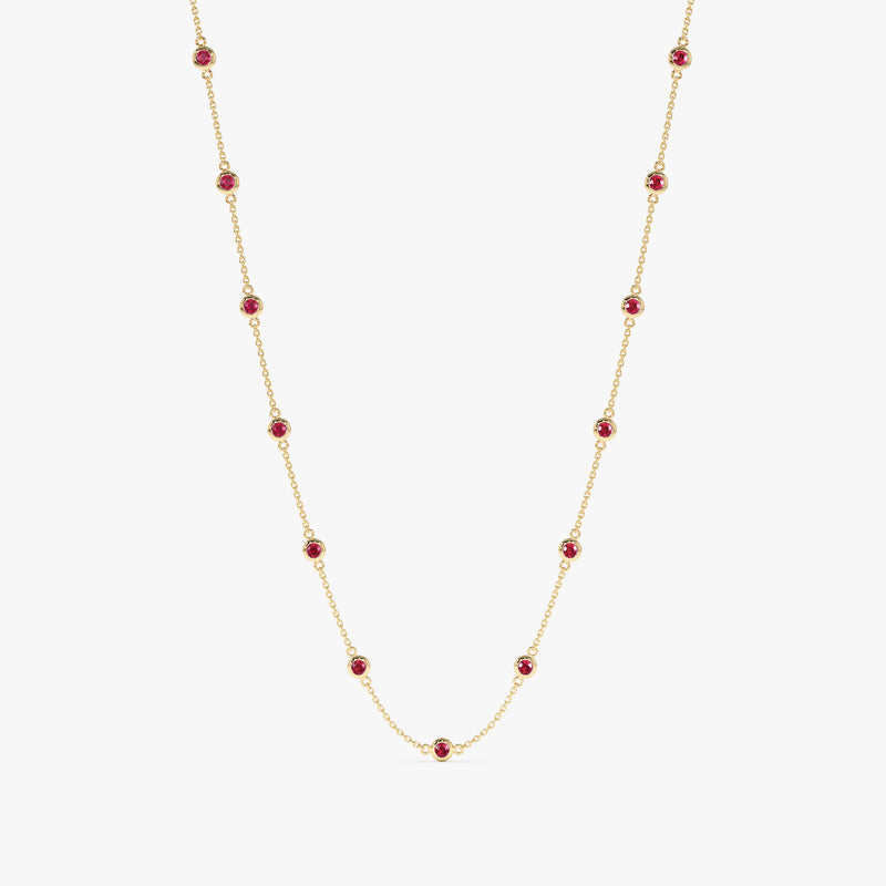 Ruby station necklace crafted in solid gold.