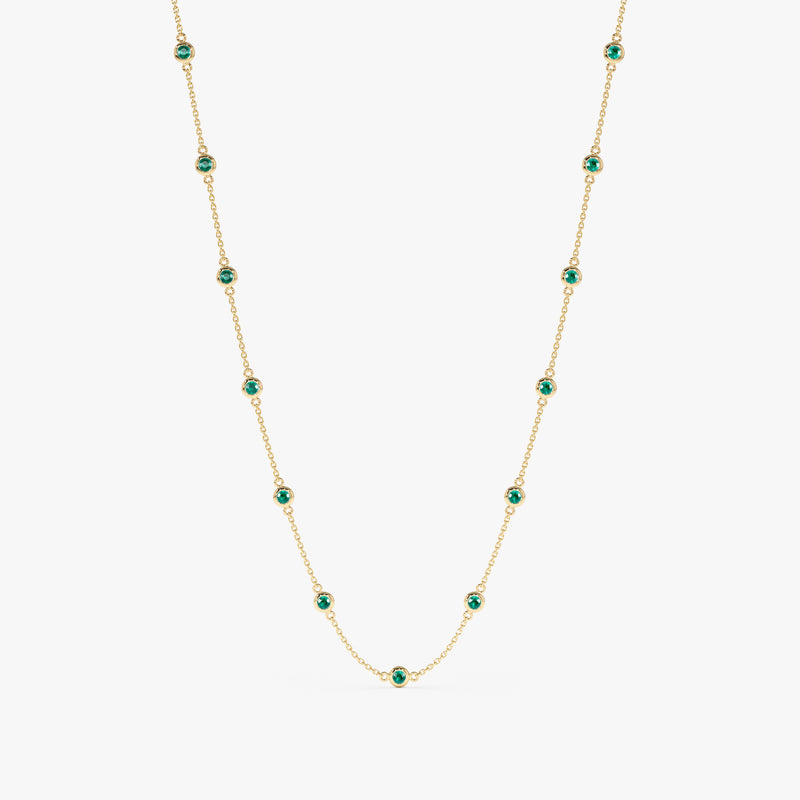 Emerald station necklace in gold