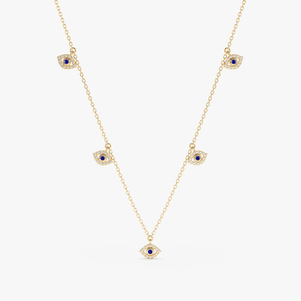 handcrafted solid 14k gold multiple hanging eye charm necklace in natural diamonds and blue sapphire