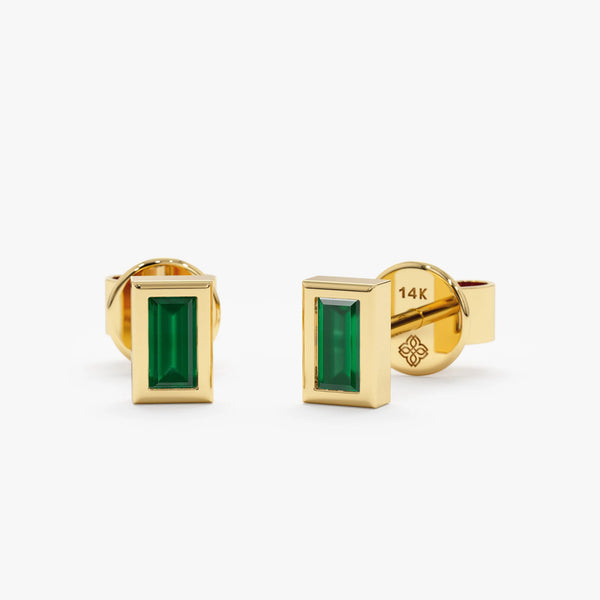 Pair of solid 14k gold baguette cut emerald stud earrings