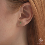 Video closeup of solid 14k gold marquise emerald studs with three diamonds gift for her
