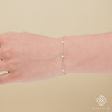 minimalist bracelet with natural pearls in solid gold