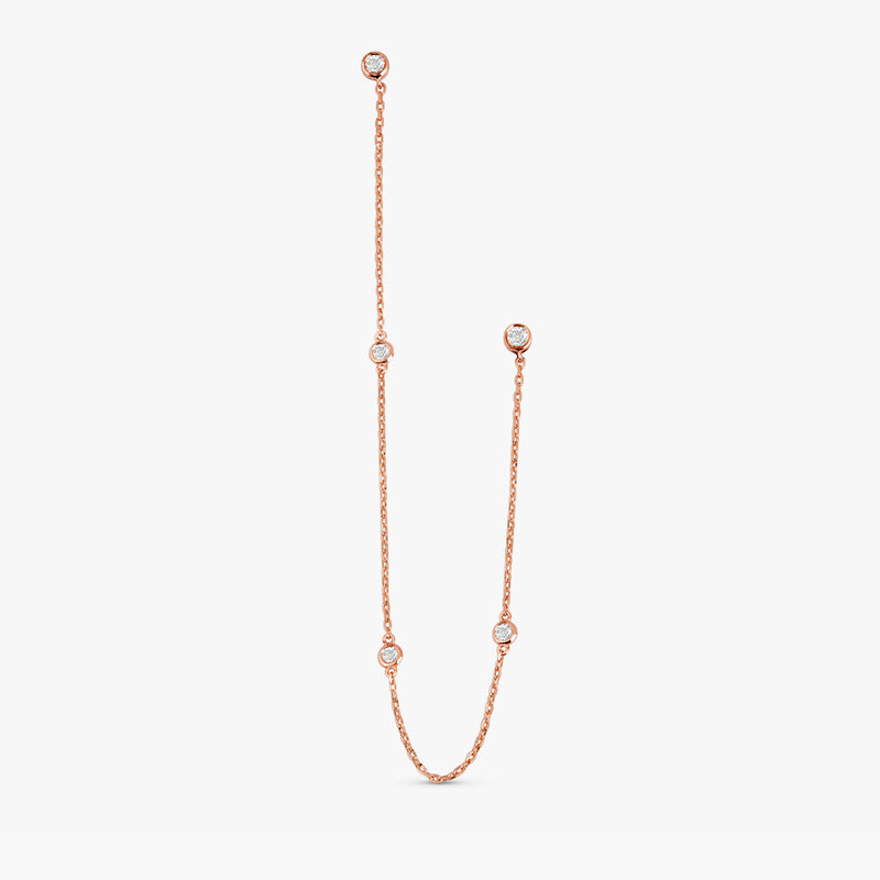 handcrafted pair of solid 14k rose gold hanging chain stud earring with multiple natural diamonds