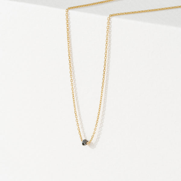 single natural Black Diamond Bead on solid gold necklace