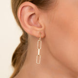 Model wears 14k Solid Gold Diamond Dangling Link Earrings 