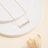 Gold and Diamond Cursive Name Necklace