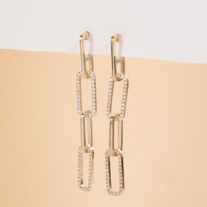 Pair of dainty chain link hanging stud earrings with white diamonds