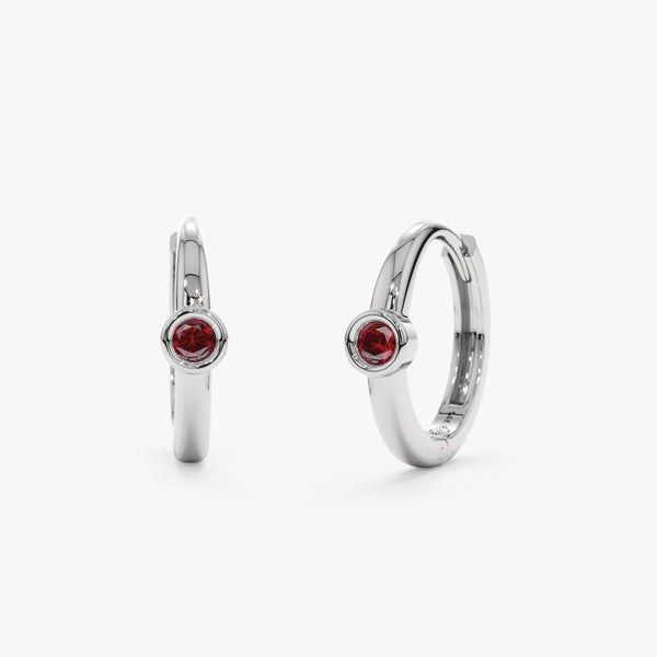 Handcrafted pair of solid 14k White Gold Ruby Huggies