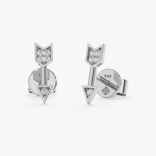 Handcrafted pair of solid 14k white gold arrow stud earrings with paved diamonds