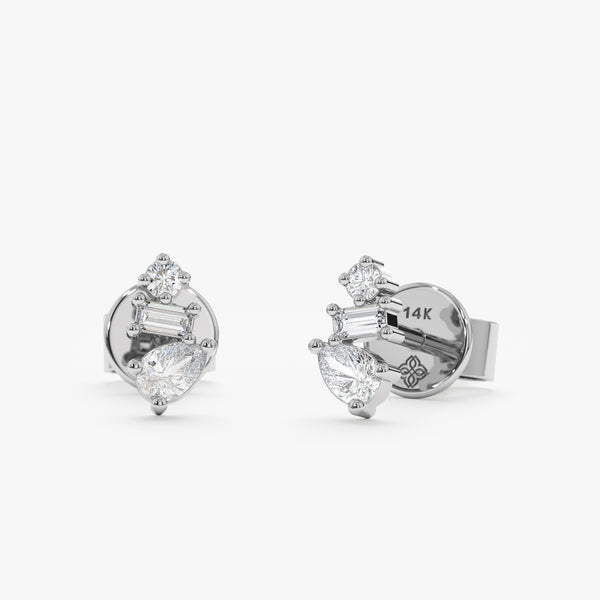 handcrafted pair of solid 14k white gold stud earrings with multiple diamond cluster