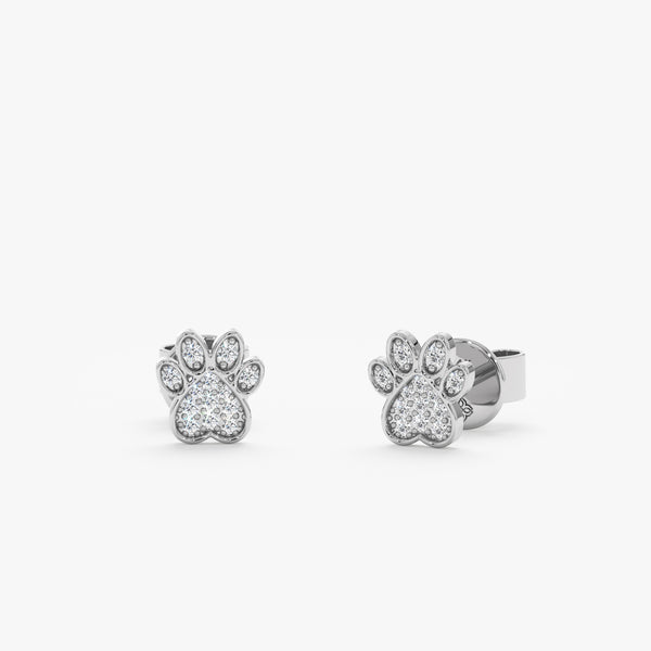 Handmade pair of solid 14k white gold puppy paw stud earrings with paved diamonds