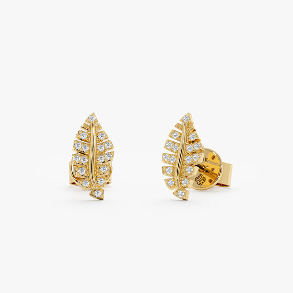 pair of handcrafted diamond encrusted leaf shape stud earrings in 14k solid gold
