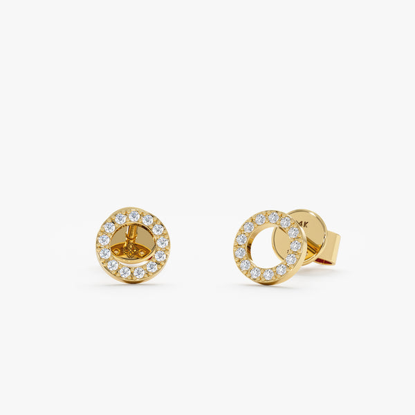 Handmade pair of solid 14k gold halo disc stud earrings lined in diamonds