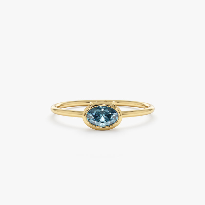 Dainty Blue Topaz Gold Ring