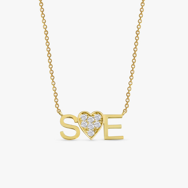 Solid yellow gold personalized initial necklace with a heart adorned with diamonds.