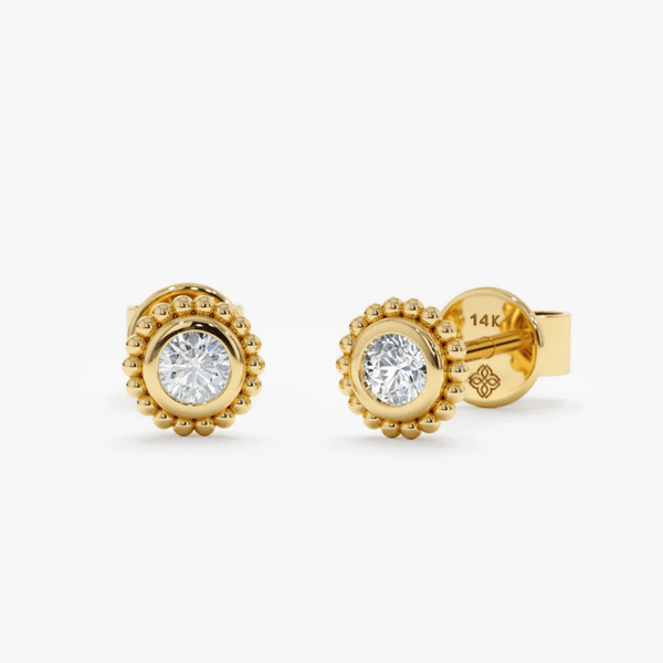 Handmade pair of solid 14k gold earrings studs in art deco frame