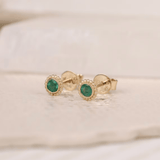 Pair of dainty 14k solid gold emerald earring studs in beaded frame bezel setting gift for her